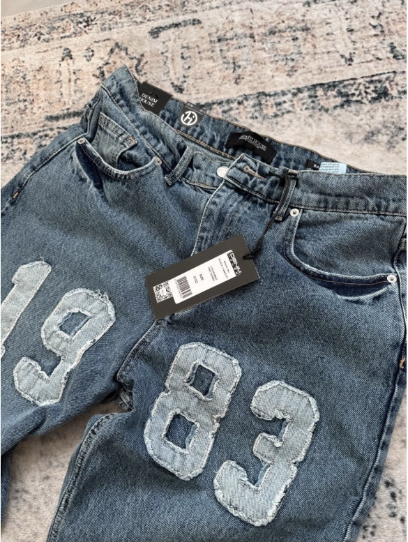Джинси Baggy з акцентною нашивкою