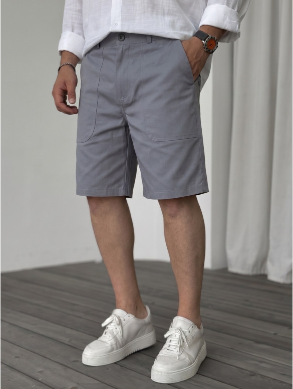 Джинсові шорти з акцентними кишенями