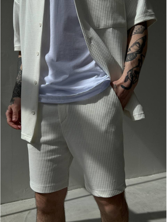Oversize костюм з фактурної тканини