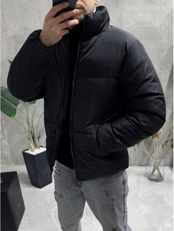 Зимова стьобана куртка oversize